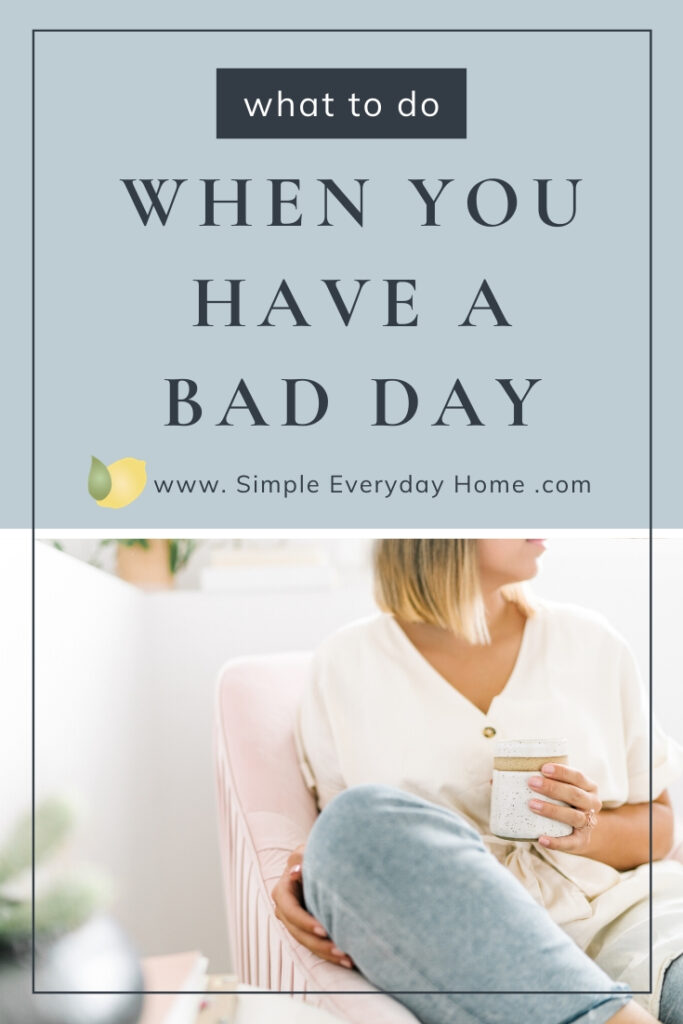 A woman holding a mug and looking to the side with the words "what to do when you have a bad day"
