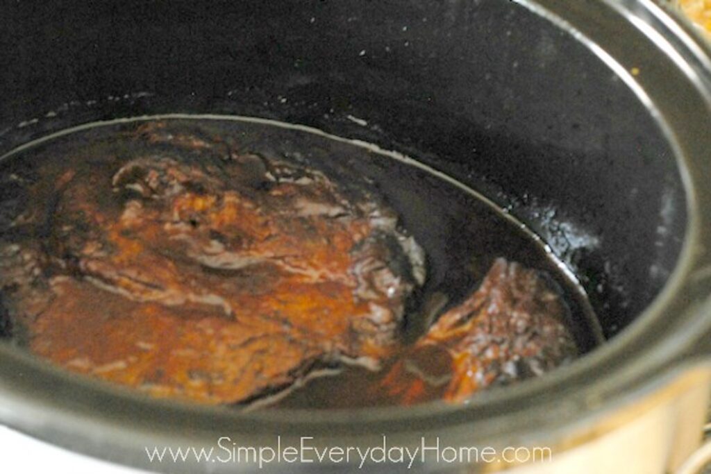 Cooked roast in barbecue sauce