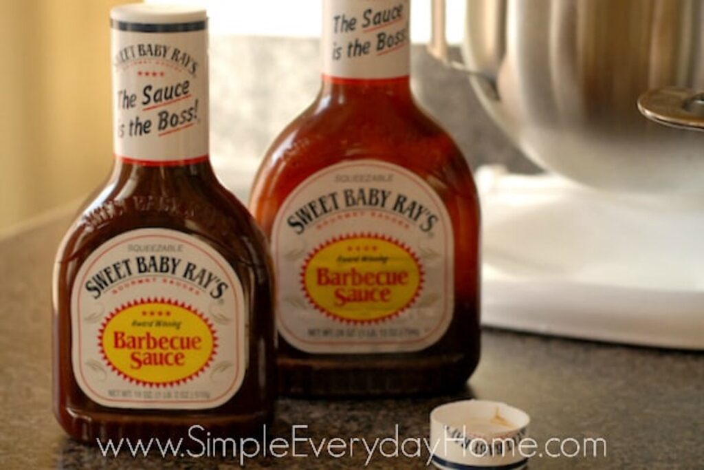 Two bottles of Sweet Baby Ray's Barbecue sauce
