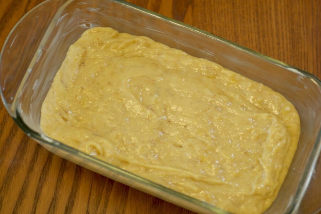 Banana bread batter in loaf pan