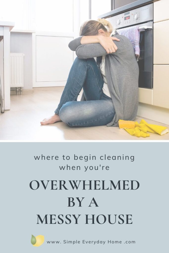 Woman sitting on kitchen floor with her head on her knees and the words "Where to begin cleaning when you're overwhelmed by a messy house"