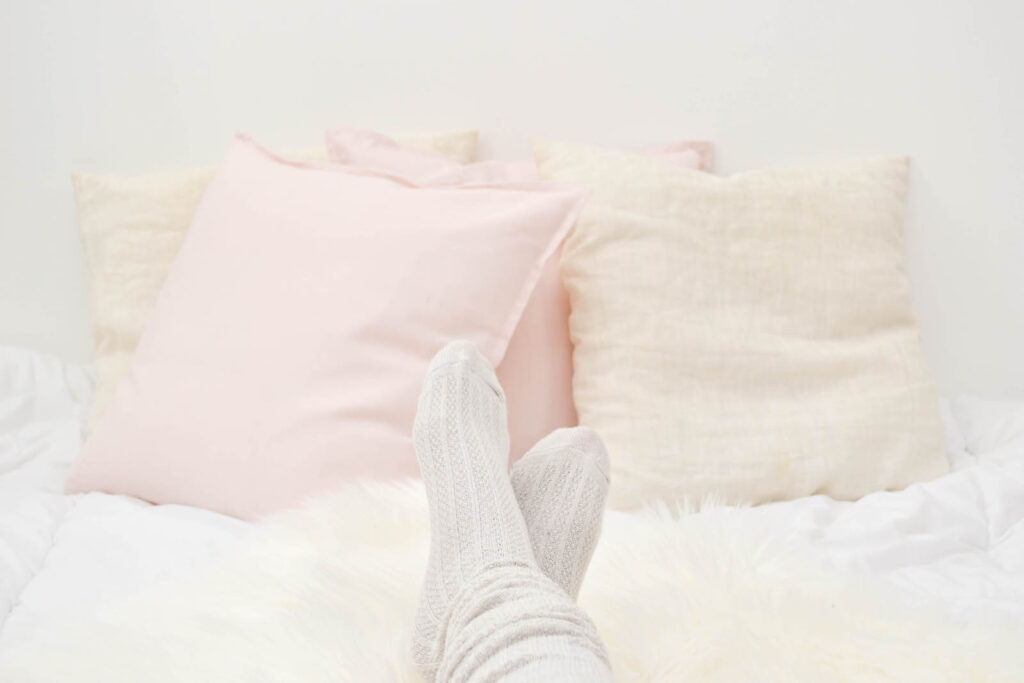pink pillows on a bed