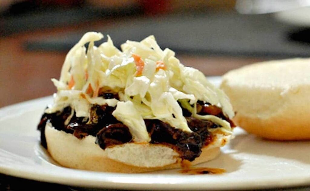 Barbecue beef sandwich with cole slaw on top