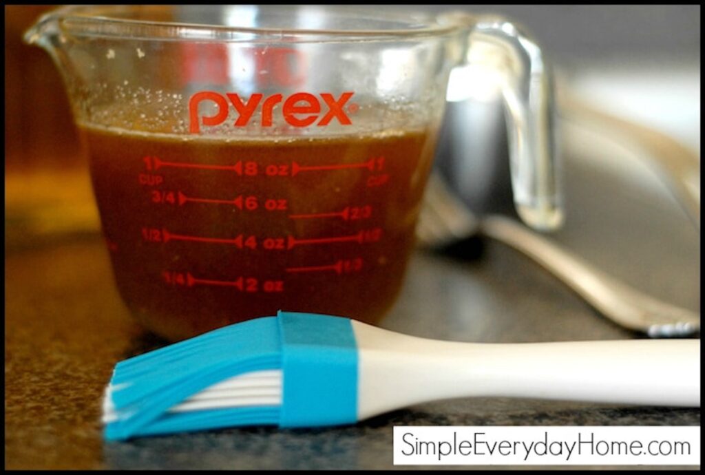 Measuring cup with glaze with a blue and white brush