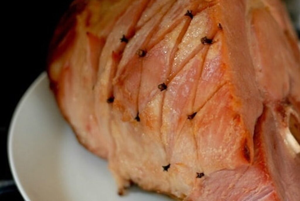 Baked Glazed Ham setting on plate