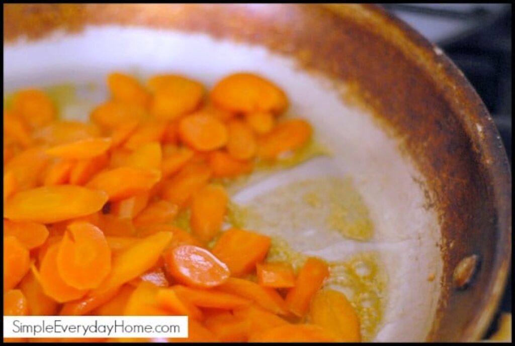 Carrots cooking in pan