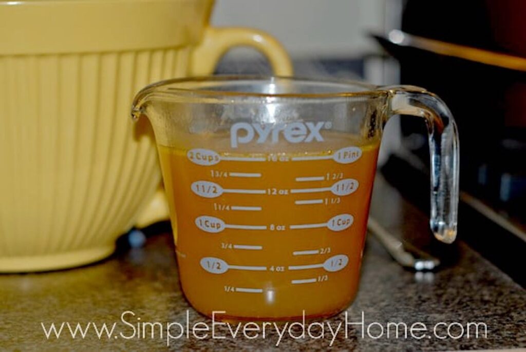 Stock in glass measuring cup